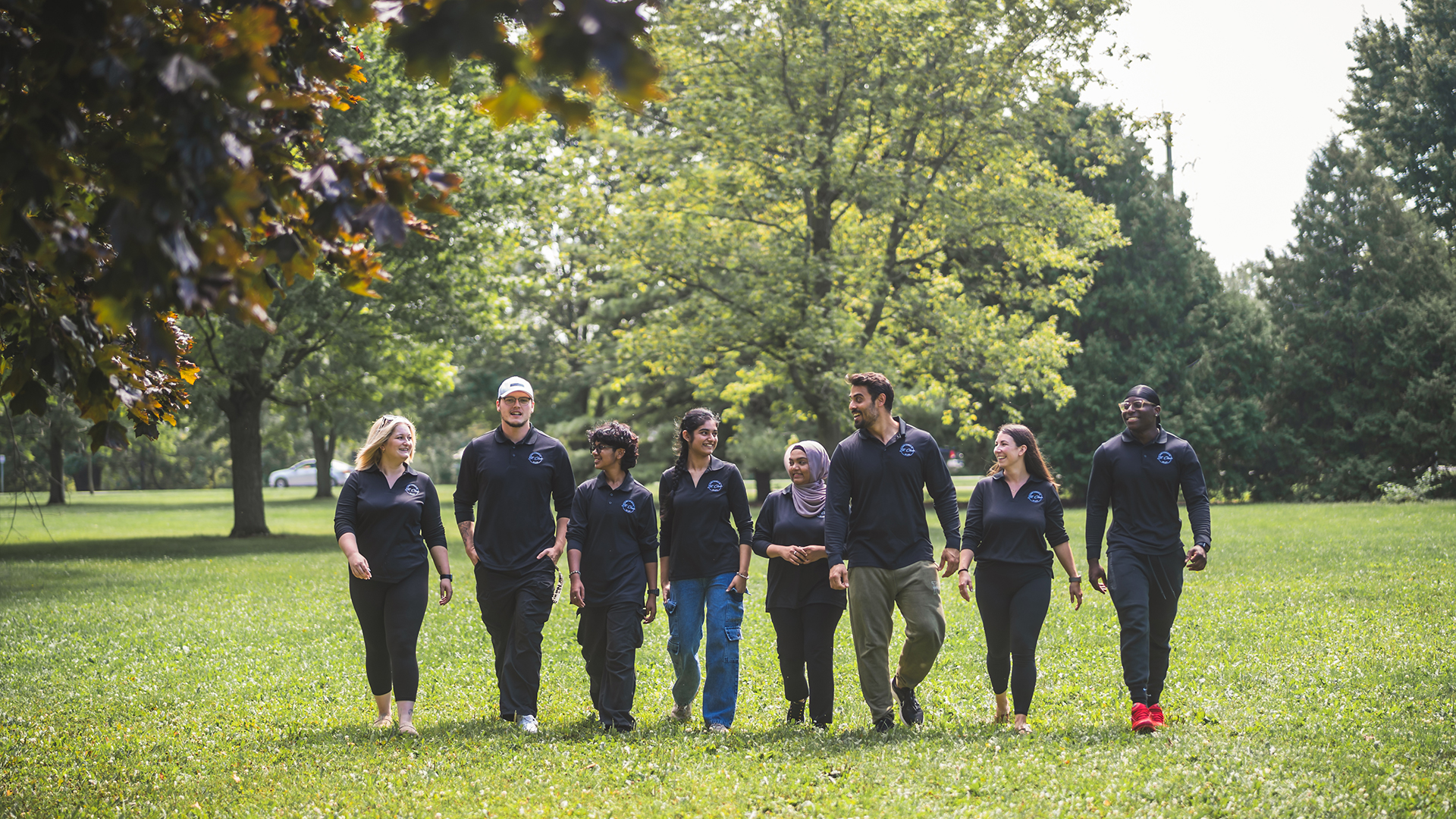 Group of TSI walking in a field